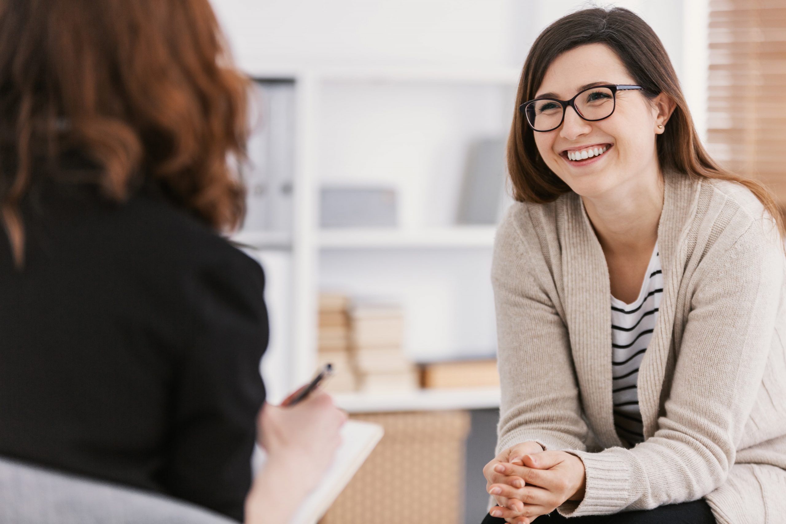 A patient's family member speaks with a Waypoint Centre team member.