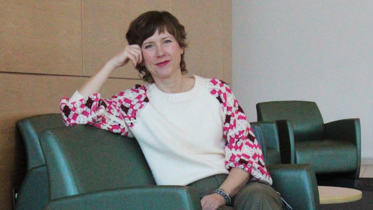 Dr. Becky Van Iersel sitting on an armchair.